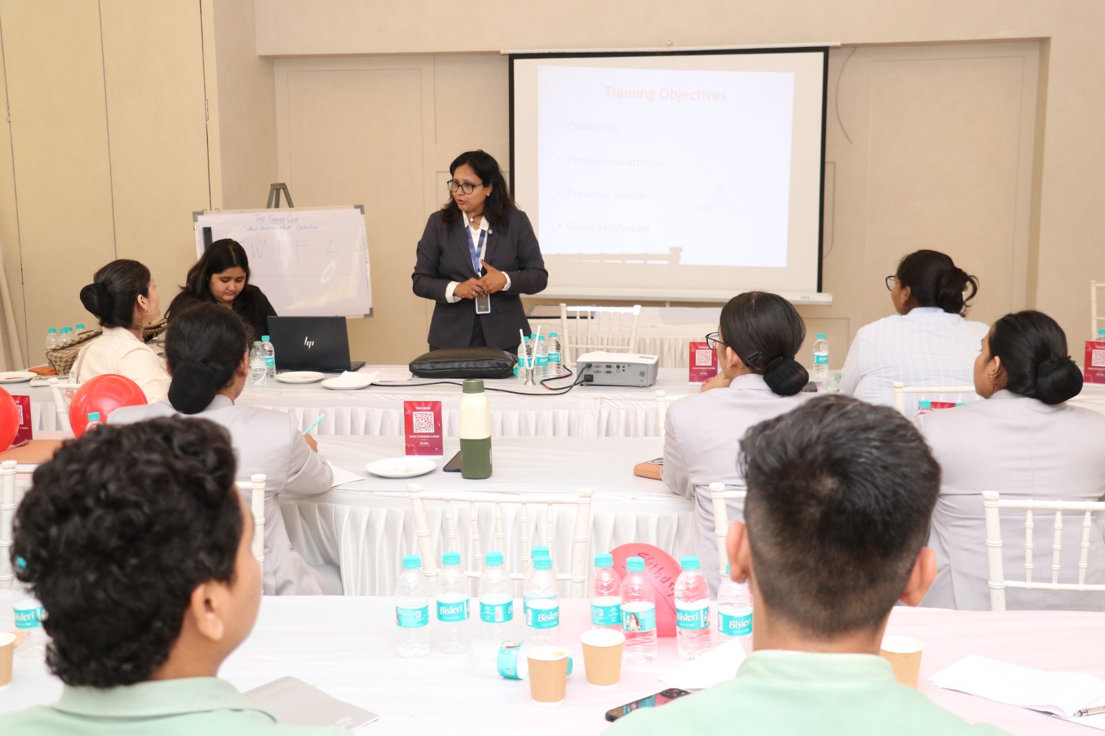 Corporate training session on professional attitude, proactive service, and guest satisfaction