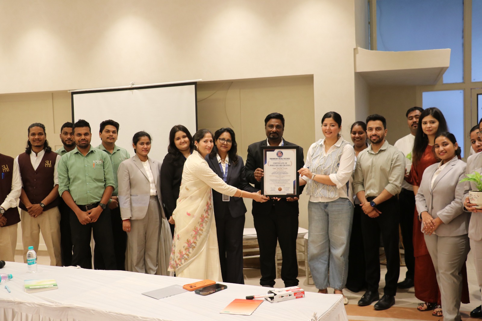 Group portrait with Paramount World Records certificate of world record creation