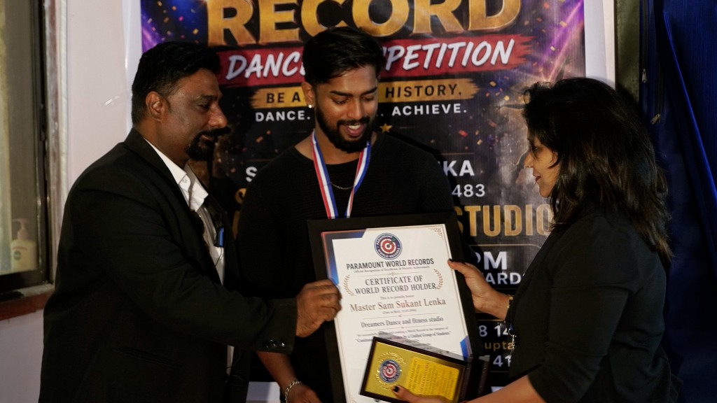 Sam Sukant Lenka receiving world record certificate and medal