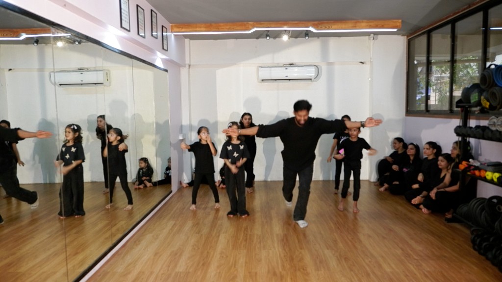 Young dancers rehearsing Bollywood choreography at Dreamers Dance Studio