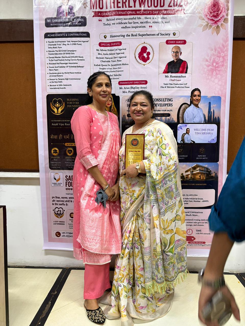 Recipients posing with Mother's Day recognition awards at Mumbai Press Club