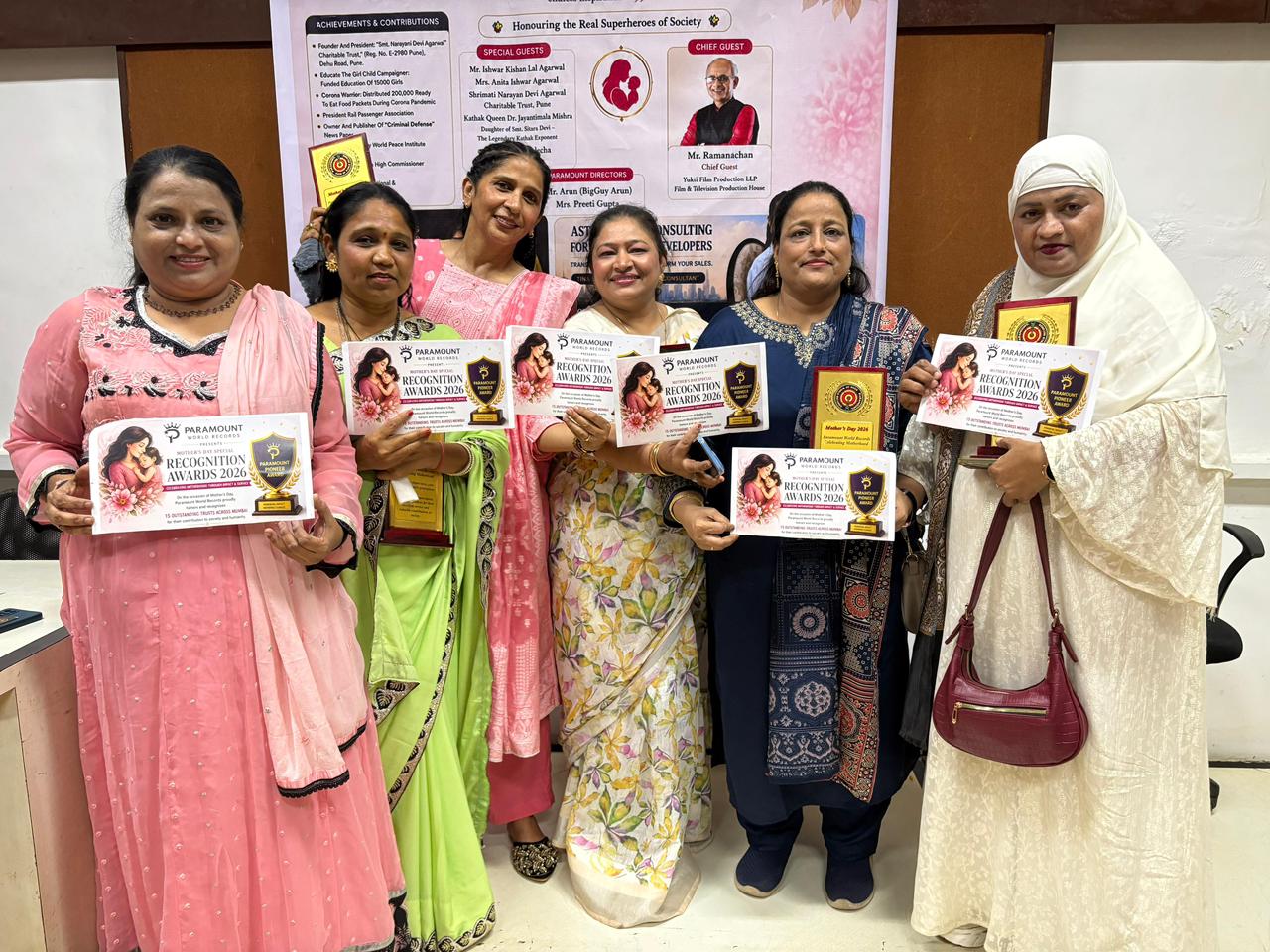 Honourees holding certificates at the Mother's Day Special Recognition Awards 2026